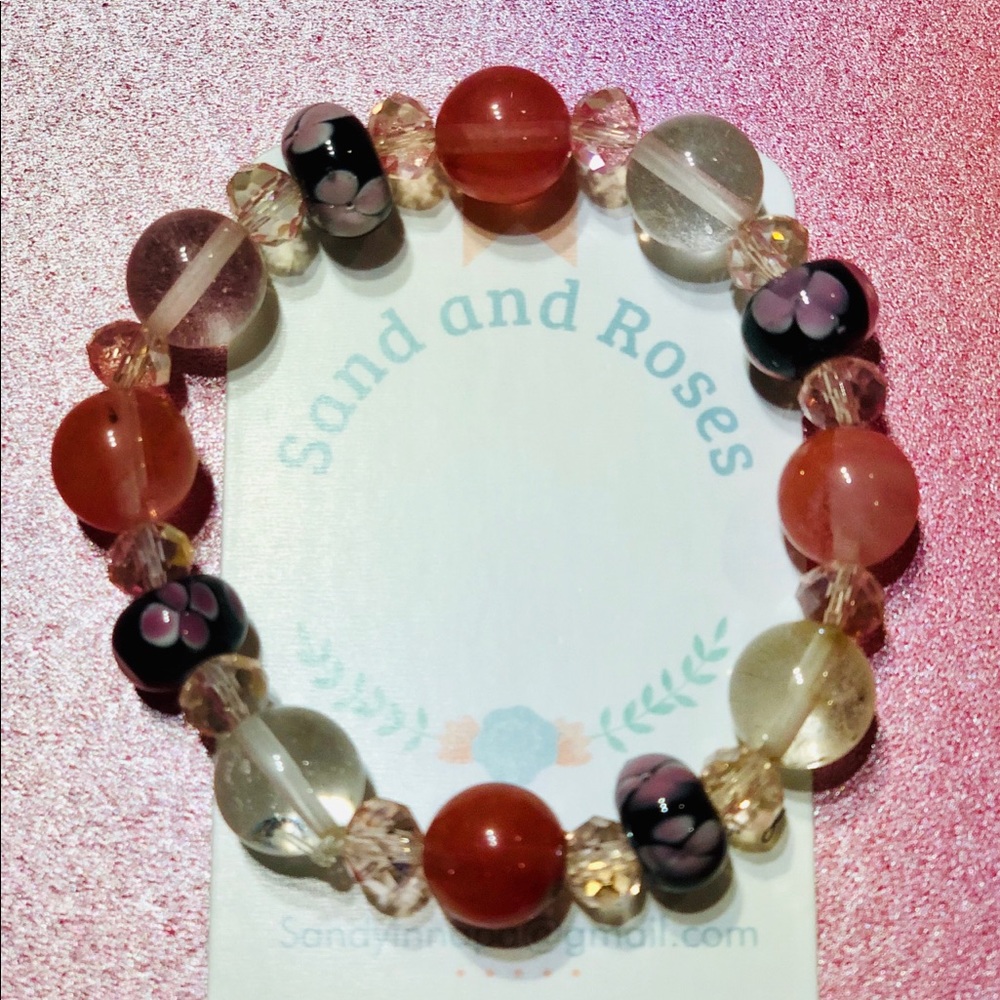 Beautiful cherry quartz and flower glass beads.